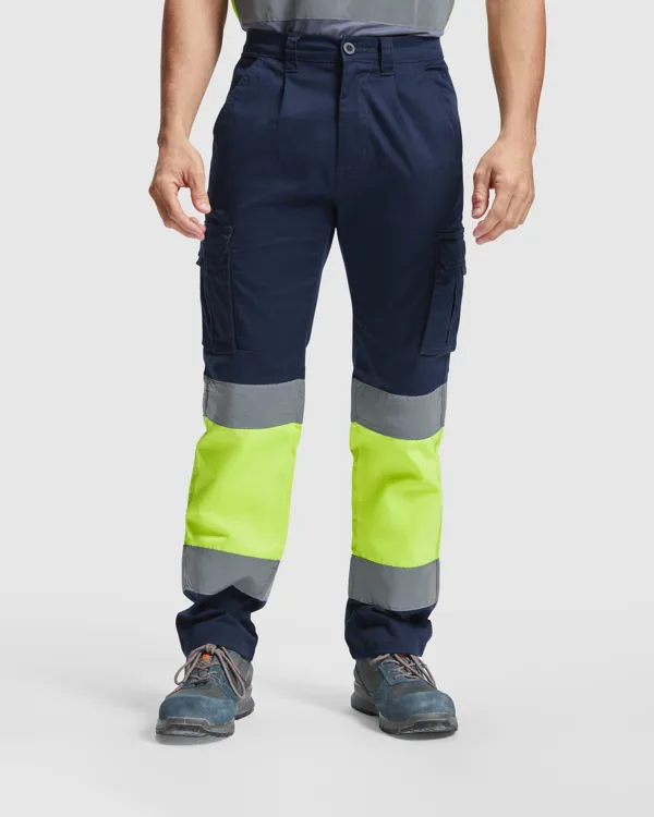 Παντελόνι υψηλής ορατότητας Roly Workwear Daily Strech HV 9312 σε μπλε/κίτρινο φλούο χρώμα