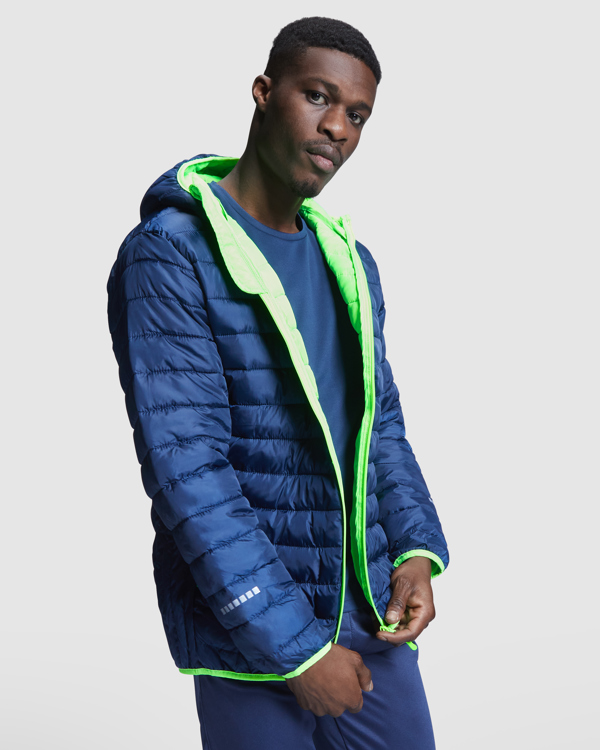 Ανδρικό αθλητικό μπουφάν softshell Roly Norway Sport 5097 σε μπλε/πράσινο φλούο χρώμα, με εκτύπωση λογοτύπου