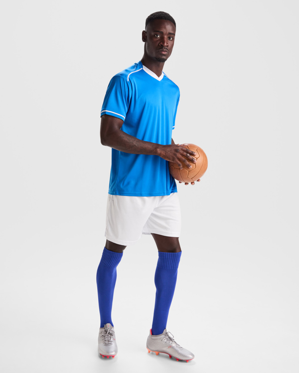 Unisex αθλητική εμφάνιση Roly United 0457 σε ρουά/λευκό χρώμα, με εκτύπωση λογοτύπου